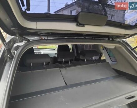 Черный Хендай Туксон, объемом двигателя 2 л и пробегом 167 тыс. км за 7900 $, фото 6 на Automoto.ua