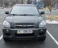Черный Хендай Туксон, объемом двигателя 2 л и пробегом 313 тыс. км за 7600 $, фото 1 на Automoto.ua