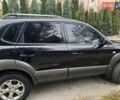 Черный Хендай Туксон, объемом двигателя 2 л и пробегом 167 тыс. км за 7900 $, фото 7 на Automoto.ua