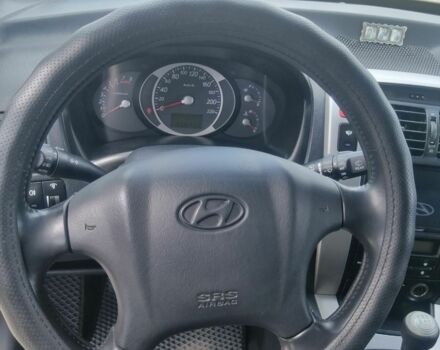 Чорний Хендай Туксон, об'ємом двигуна 2 л та пробігом 257 тис. км за 8900 $, фото 6 на Automoto.ua