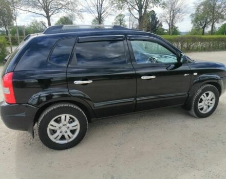 Чорний Хендай Туксон, об'ємом двигуна 2 л та пробігом 257 тис. км за 8900 $, фото 1 на Automoto.ua