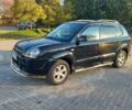 Чорний Хендай Туксон, об'ємом двигуна 2 л та пробігом 230 тис. км за 10000 $, фото 1 на Automoto.ua
