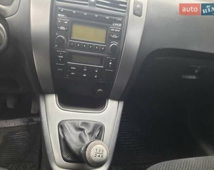 Черный Хендай Туксон, объемом двигателя 2 л и пробегом 167 тыс. км за 7900 $, фото 1 на Automoto.ua