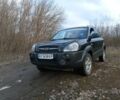 Черный Хендай Туксон, объемом двигателя 2 л и пробегом 210 тыс. км за 9000 $, фото 1 на Automoto.ua
