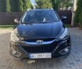 Чорний Хендай Туксон, об'ємом двигуна 2.4 л та пробігом 152 тис. км за 13035 $, фото 1 на Automoto.ua