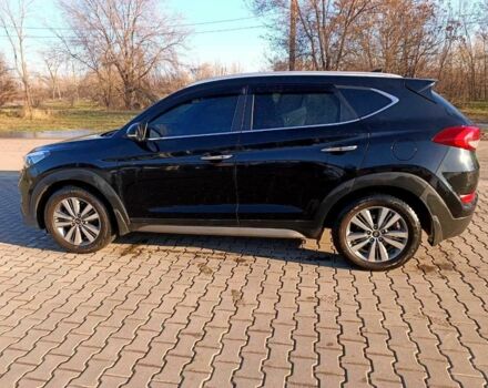 Черный Хендай Туксон, объемом двигателя 2 л и пробегом 148 тыс. км за 17800 $, фото 1 на Automoto.ua