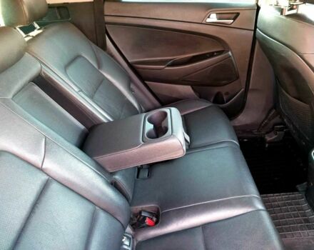 Черный Хендай Туксон, объемом двигателя 2 л и пробегом 148 тыс. км за 17800 $, фото 4 на Automoto.ua