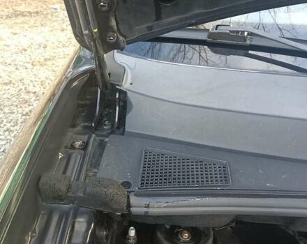 Черный Хендай Туксон, объемом двигателя 2 л и пробегом 236 тыс. км за 6000 $, фото 28 на Automoto.ua