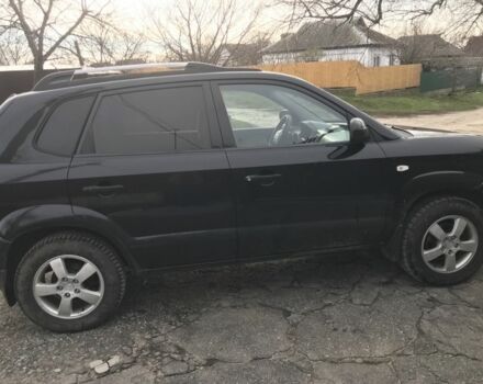 Чорний Хендай Туксон, об'ємом двигуна 2 л та пробігом 270 тис. км за 5850 $, фото 7 на Automoto.ua