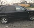 Чорний Хендай Туксон, об'ємом двигуна 2 л та пробігом 270 тис. км за 5850 $, фото 7 на Automoto.ua