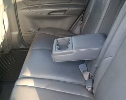 Черный Хендай Туксон, объемом двигателя 2 л и пробегом 236 тыс. км за 6000 $, фото 12 на Automoto.ua