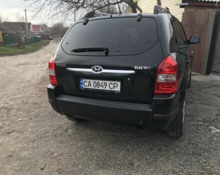 Чорний Хендай Туксон, об'ємом двигуна 2 л та пробігом 270 тис. км за 5850 $, фото 5 на Automoto.ua