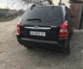 Чорний Хендай Туксон, об'ємом двигуна 2 л та пробігом 270 тис. км за 5850 $, фото 5 на Automoto.ua