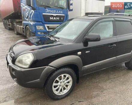 Черный Хендай Туксон, объемом двигателя 1.99 л и пробегом 204 тыс. км за 6100 $, фото 1 на Automoto.ua