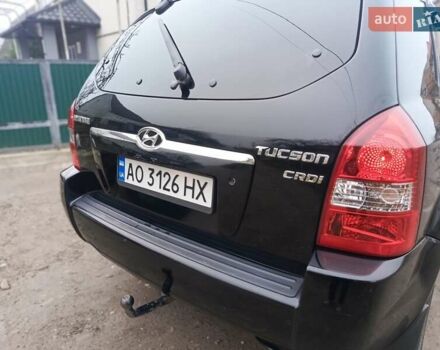 Черный Хендай Туксон, объемом двигателя 1.99 л и пробегом 302 тыс. км за 6300 $, фото 17 на Automoto.ua