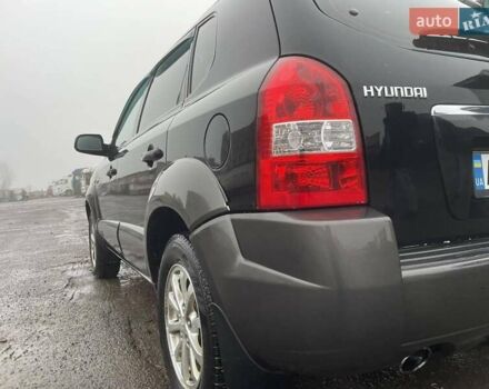 Черный Хендай Туксон, объемом двигателя 1.99 л и пробегом 204 тыс. км за 6100 $, фото 10 на Automoto.ua