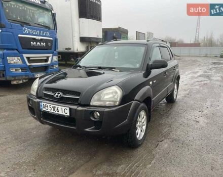 Черный Хендай Туксон, объемом двигателя 1.99 л и пробегом 204 тыс. км за 6100 $, фото 5 на Automoto.ua