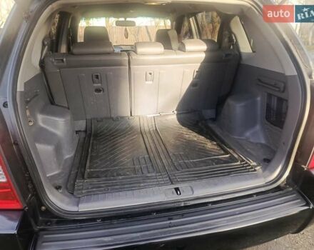 Черный Хендай Туксон, объемом двигателя 1.99 л и пробегом 302 тыс. км за 6300 $, фото 11 на Automoto.ua