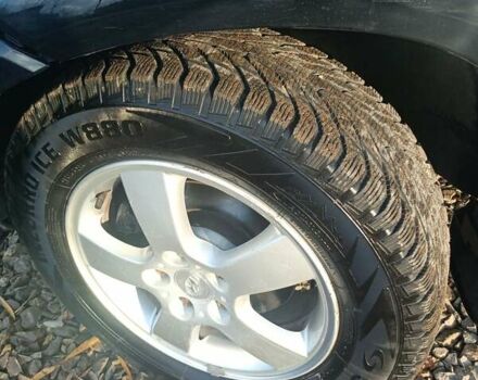 Черный Хендай Туксон, объемом двигателя 2 л и пробегом 236 тыс. км за 6000 $, фото 15 на Automoto.ua