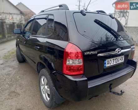 Черный Хендай Туксон, объемом двигателя 1.99 л и пробегом 302 тыс. км за 6300 $, фото 18 на Automoto.ua