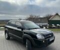 Черный Хендай Туксон, объемом двигателя 2 л и пробегом 180 тыс. км за 6450 $, фото 12 на Automoto.ua