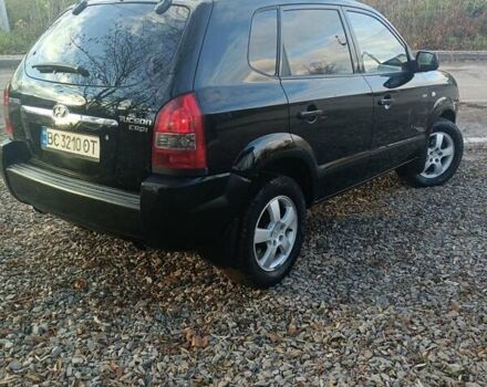 Черный Хендай Туксон, объемом двигателя 2 л и пробегом 236 тыс. км за 6000 $, фото 9 на Automoto.ua