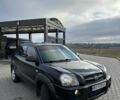 Черный Хендай Туксон, объемом двигателя 2 л и пробегом 180 тыс. км за 6450 $, фото 16 на Automoto.ua