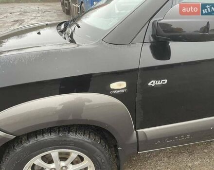 Черный Хендай Туксон, объемом двигателя 1.99 л и пробегом 204 тыс. км за 6100 $, фото 22 на Automoto.ua