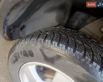 Черный Хендай Туксон, объемом двигателя 1.99 л и пробегом 302 тыс. км за 6300 $, фото 12 на Automoto.ua