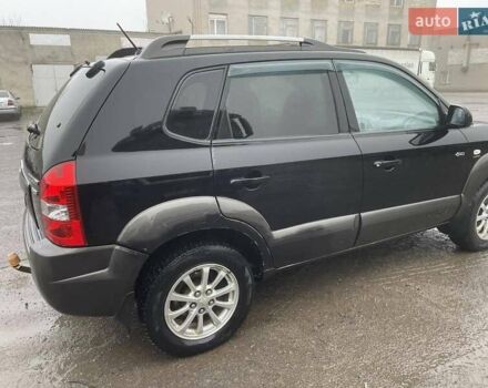 Черный Хендай Туксон, объемом двигателя 1.99 л и пробегом 204 тыс. км за 6100 $, фото 15 на Automoto.ua