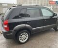 Черный Хендай Туксон, объемом двигателя 1.99 л и пробегом 204 тыс. км за 6100 $, фото 15 на Automoto.ua