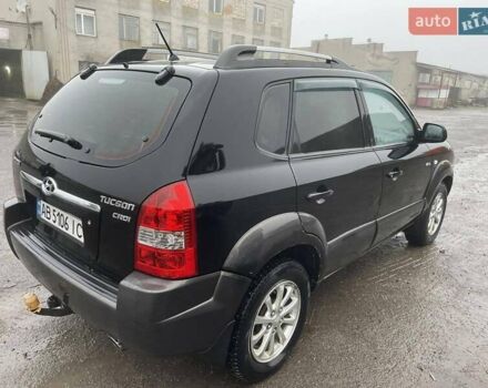 Черный Хендай Туксон, объемом двигателя 1.99 л и пробегом 204 тыс. км за 6100 $, фото 24 на Automoto.ua