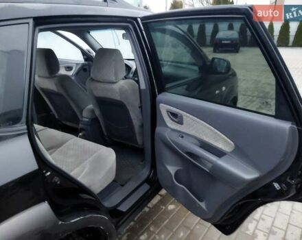 Черный Хендай Туксон, объемом двигателя 1.99 л и пробегом 204 тыс. км за 6100 $, фото 39 на Automoto.ua