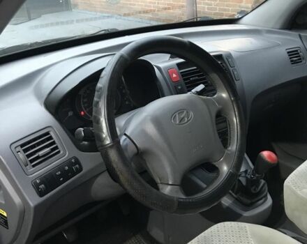 Чорний Хендай Туксон, об'ємом двигуна 2 л та пробігом 270 тис. км за 5850 $, фото 1 на Automoto.ua