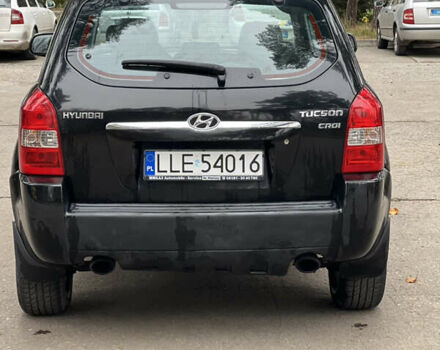 Черный Хендай Туксон, объемом двигателя 2 л и пробегом 280 тыс. км за 3250 $, фото 3 на Automoto.ua