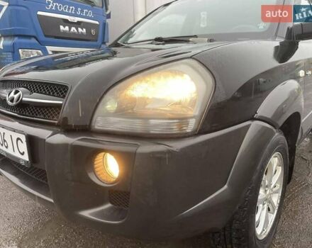 Черный Хендай Туксон, объемом двигателя 1.99 л и пробегом 204 тыс. км за 6100 $, фото 8 на Automoto.ua