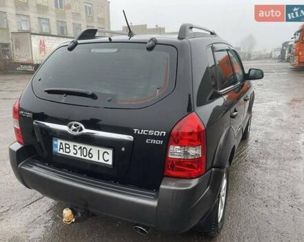 Черный Хендай Туксон, объемом двигателя 1.99 л и пробегом 204 тыс. км за 6100 $, фото 14 на Automoto.ua