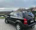 Черный Хендай Туксон, объемом двигателя 2 л и пробегом 180 тыс. км за 6450 $, фото 17 на Automoto.ua
