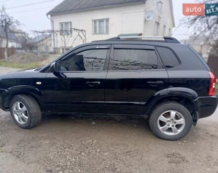 Черный Хендай Туксон, объемом двигателя 1.99 л и пробегом 302 тыс. км за 6300 $, фото 19 на Automoto.ua