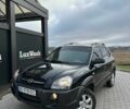 Черный Хендай Туксон, объемом двигателя 2 л и пробегом 180 тыс. км за 6450 $, фото 6 на Automoto.ua