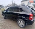 Черный Хендай Туксон, объемом двигателя 1.99 л и пробегом 302 тыс. км за 6300 $, фото 16 на Automoto.ua