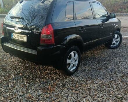 Черный Хендай Туксон, объемом двигателя 2 л и пробегом 236 тыс. км за 6000 $, фото 6 на Automoto.ua