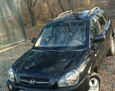 Черный Хендай Туксон, объемом двигателя 2 л и пробегом 236 тыс. км за 6000 $, фото 7 на Automoto.ua