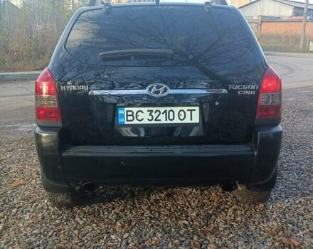 Черный Хендай Туксон, объемом двигателя 2 л и пробегом 236 тыс. км за 6000 $, фото 2 на Automoto.ua