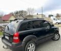 Черный Хендай Туксон, объемом двигателя 2 л и пробегом 180 тыс. км за 6450 $, фото 5 на Automoto.ua