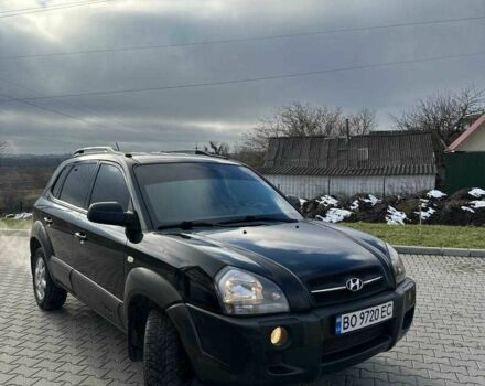 Черный Хендай Туксон, объемом двигателя 2 л и пробегом 180 тыс. км за 6450 $, фото 21 на Automoto.ua