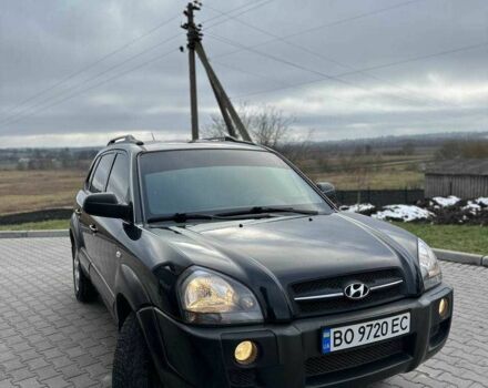 Черный Хендай Туксон, объемом двигателя 2 л и пробегом 180 тыс. км за 6450 $, фото 4 на Automoto.ua