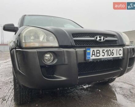 Черный Хендай Туксон, объемом двигателя 1.99 л и пробегом 204 тыс. км за 6100 $, фото 3 на Automoto.ua