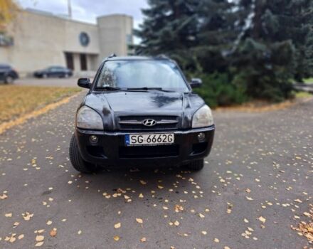 Черный Хендай Туксон, объемом двигателя 2 л и пробегом 280 тыс. км за 3250 $, фото 1 на Automoto.ua