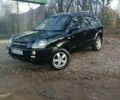 Черный Хендай Туксон, объемом двигателя 2 л и пробегом 236 тыс. км за 6000 $, фото 5 на Automoto.ua